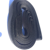 Dark navy woven recovery leash strap, coiled with looped end