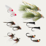 Assorted trout flies with feather and foam bodies, barbed hooks, green and black.