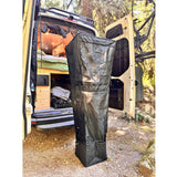 Outdoor hanging shower kit in black fabric with hanging straps and storage compartment