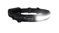 Black LED headlamp on headband with front light strip glowing