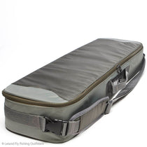Fly rod and reel carry-on case with zippered top and shoulder strap, gray exterior.