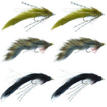 Assorted streamer fishing flies on hooks: green, gray, and black