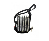 Black tippet leash with coiled line, stacked spools, and D-ring clip