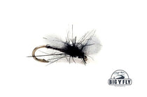 Black midge pupa fly fishing lure with fuzzy wings and gold hook