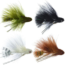 Green feather fishing fly with red eye and curled hook, articulated trout style