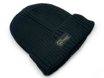 Dark green knit beanie hat with cuff and Moonlit logo patch