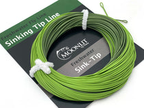 Dark olive green sink-tip fly line coiled on package card