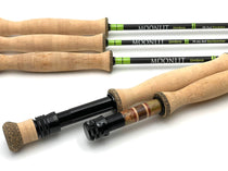 Fly fishing fly rod with cork handle, green accents, and black reel seat, sections shown