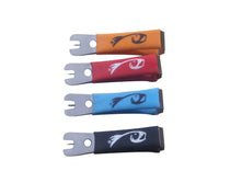 Set of Nippas clips with colorful fabric sleeves and metal prongs: orange, red, blue, black