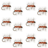 Orange and black striped dry fly with white wings and barbed hook