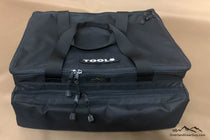 Charcoal tool bag organizer with padded top handle, open zip compartment, and side straps