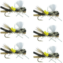 Feather fishing flies, black and tan foam bodies with yellow accents and barbed hooks