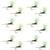 Green high-visibility foam spinner fly with black hook and trailing fibers