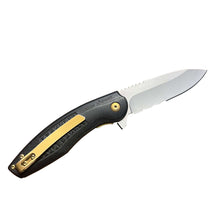 Folding knife with black textured handle, gold accents, and silver blade