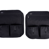 Pair of black rear door storage panels with zippered pockets