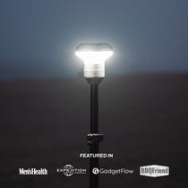 Glowing rectangular LED lantern head on black telescoping pole