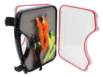 Foam popper fly assortment in black fly box, orange and green flies