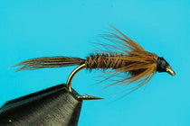 Brown pheasant tail soft hackle fishing fly with trailing feather fibers