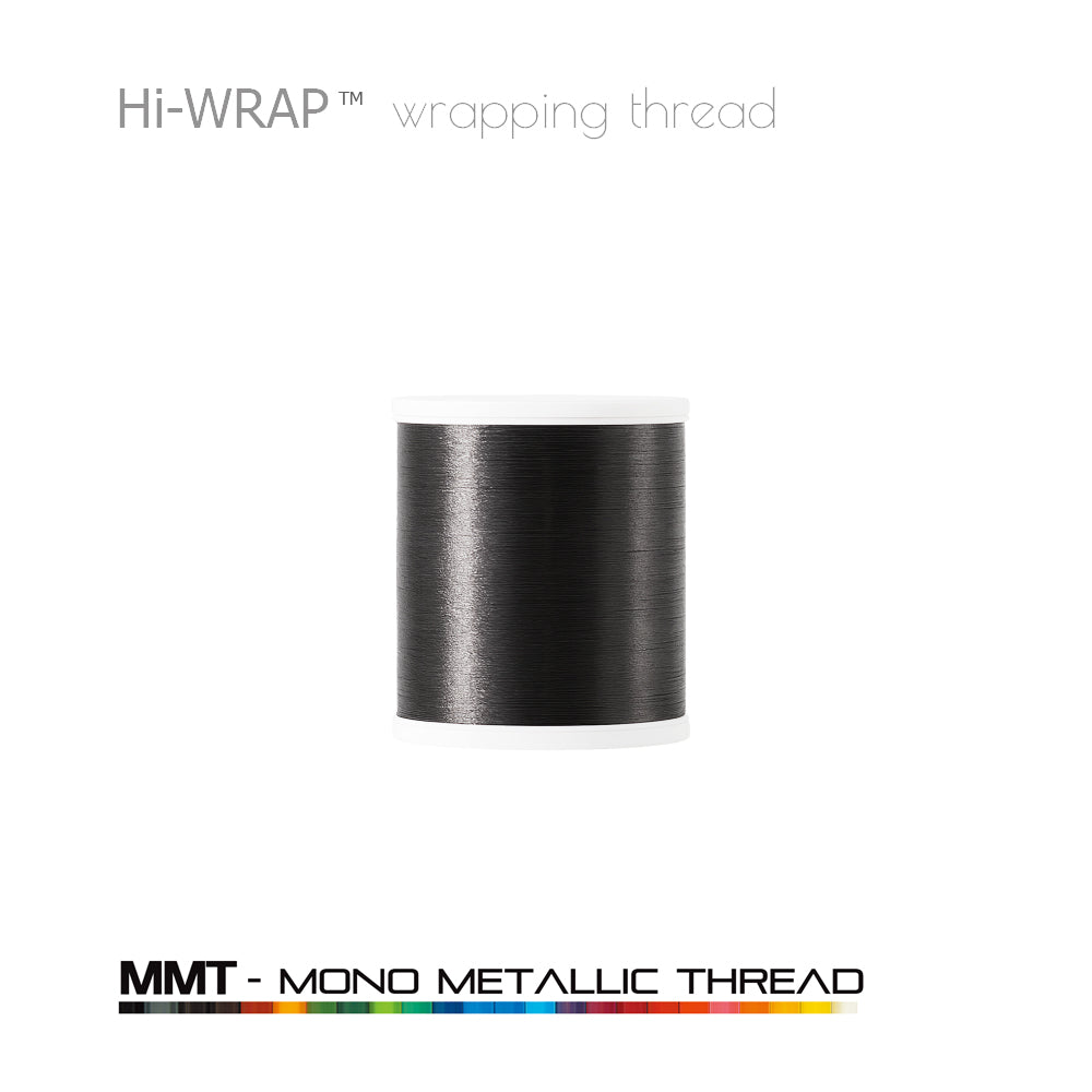 Metallic wrapping thread spool, silver mono metallic thread on a white base