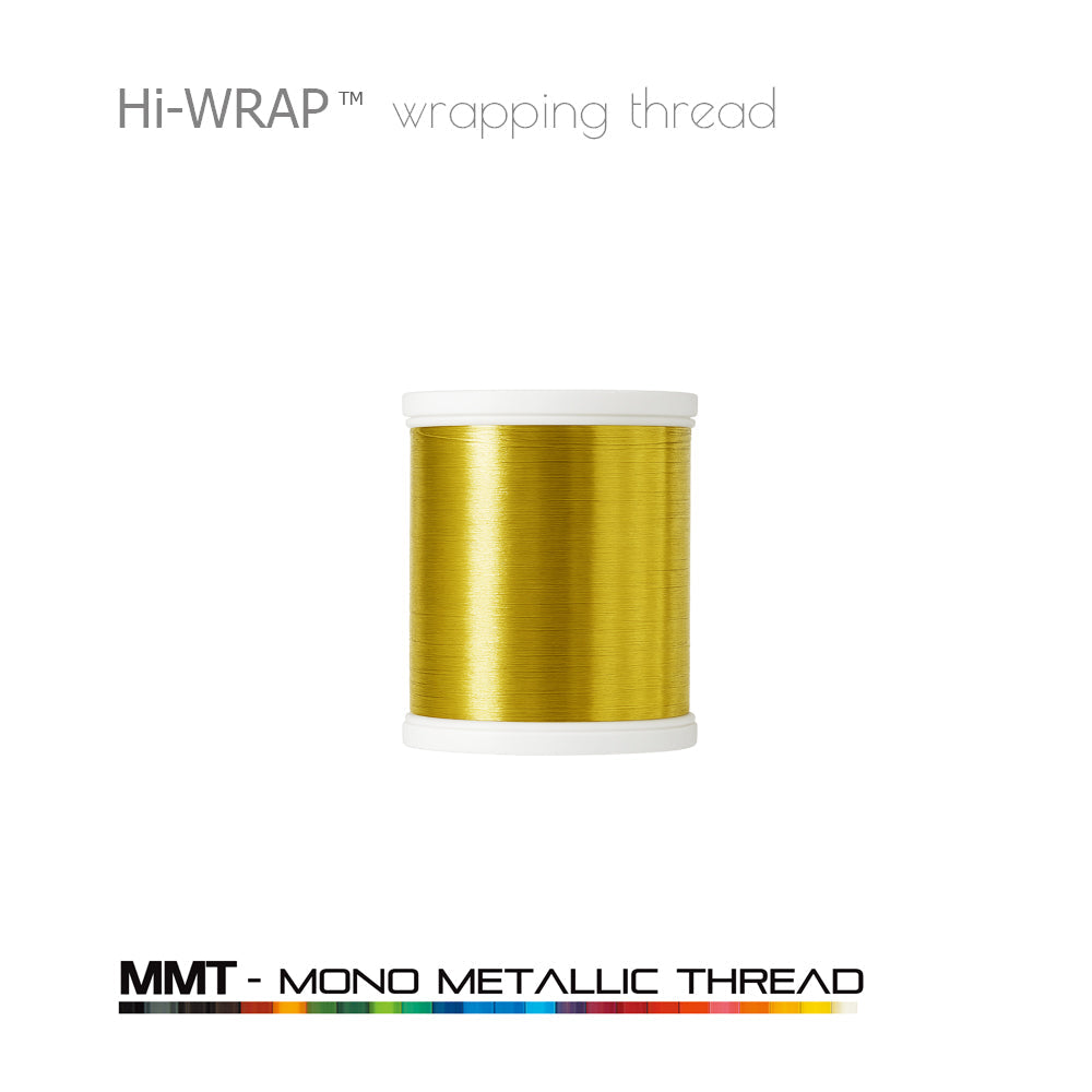 Metallic wrapping thread spool, gold mono metallic thread on a white base