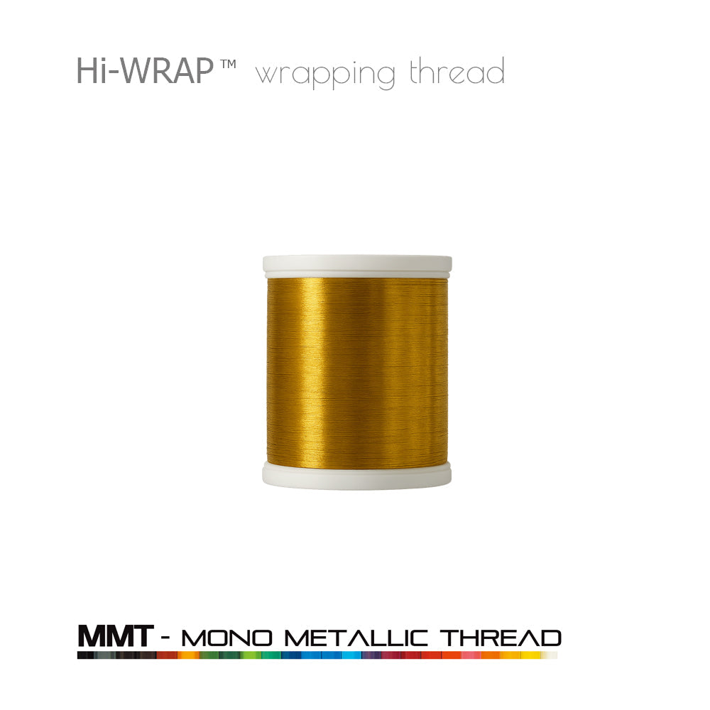 Metallic wrapping thread spool, dark gold mono metallic thread on a white base