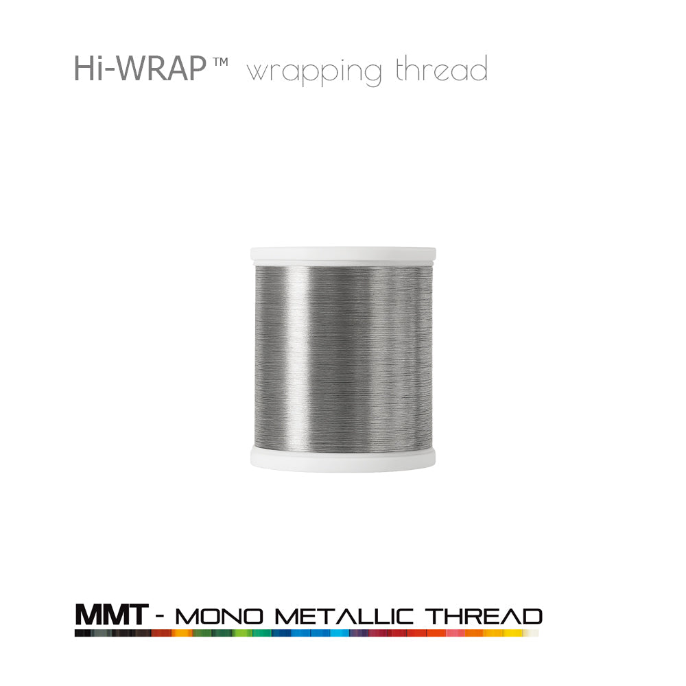 Metallic wrapping thread spool, brushed silver mono metallic thread on a white base