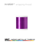 Metallic wrapping thread spool, lavender purple mono metallic thread on a white base