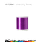 Metallic wrapping thread spool, lavender purple mono metallic thread on a white base