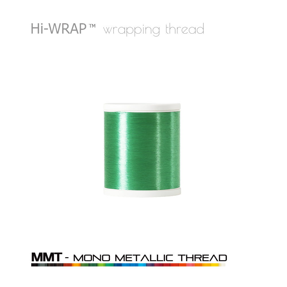 Metallic wrapping thread spool, shamrock green mono metallic thread on a white base