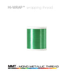 Metallic wrapping thread spool, shamrock green mono metallic thread on a white base