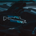 Black hoodie close-up: white and blue fish logo with striped panel design