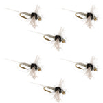 Fly hook with black body, tan wing fibers, gold eye; spinner-style