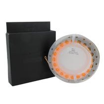 Weight-forward floating fly line spool with orange loops and black storage box