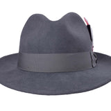 Dark grey wool felt fedora back view with dark band and side feather trim.