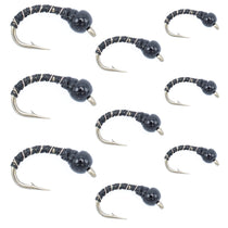 Black zebra midge flies set on hooks with dark mottled fuzzy bodies
