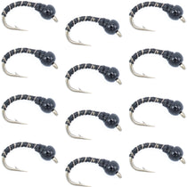 Set of black zebra midge bead head flies with black segmented bodies, size 18