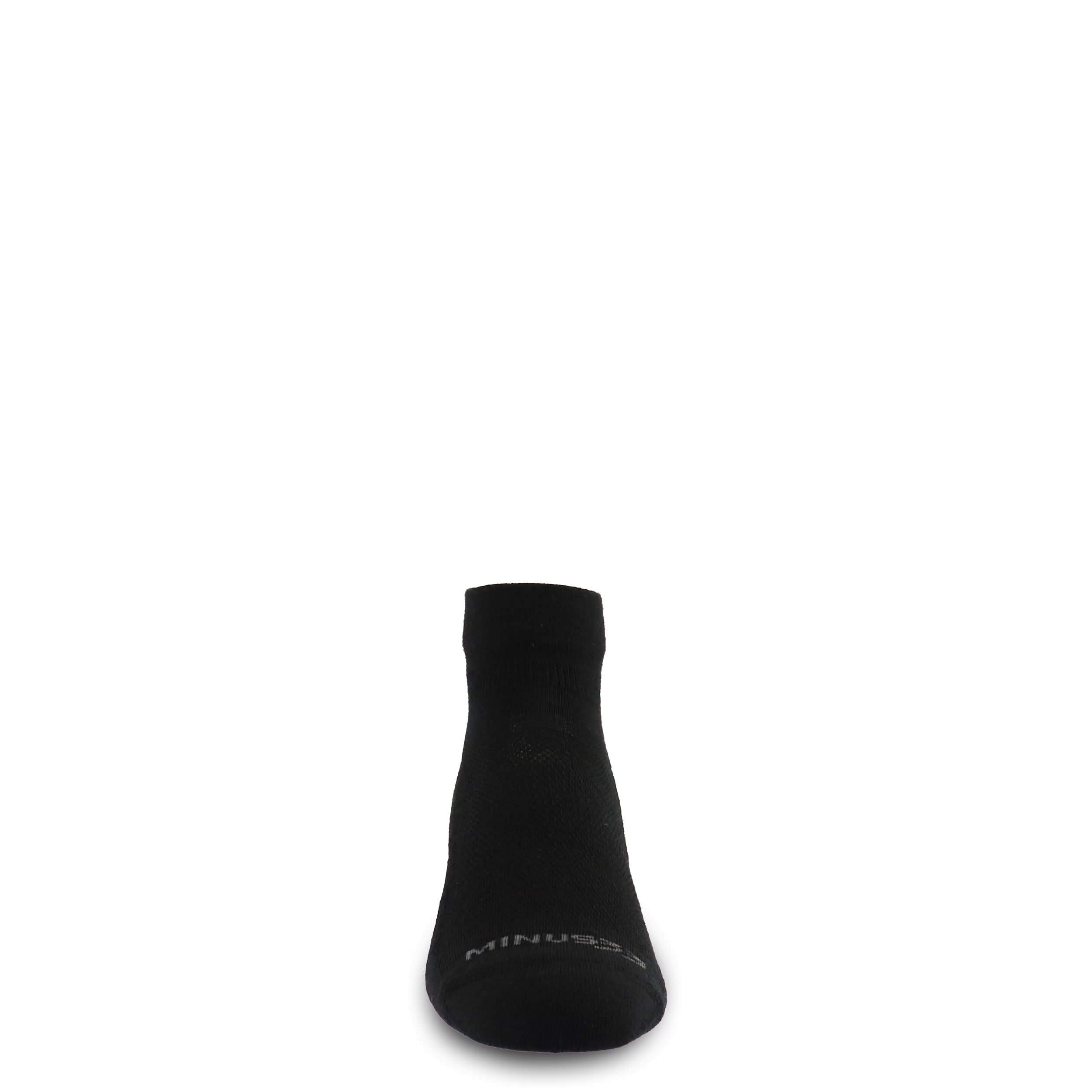 Merino wool trail running ankle socks in black with logo at sole