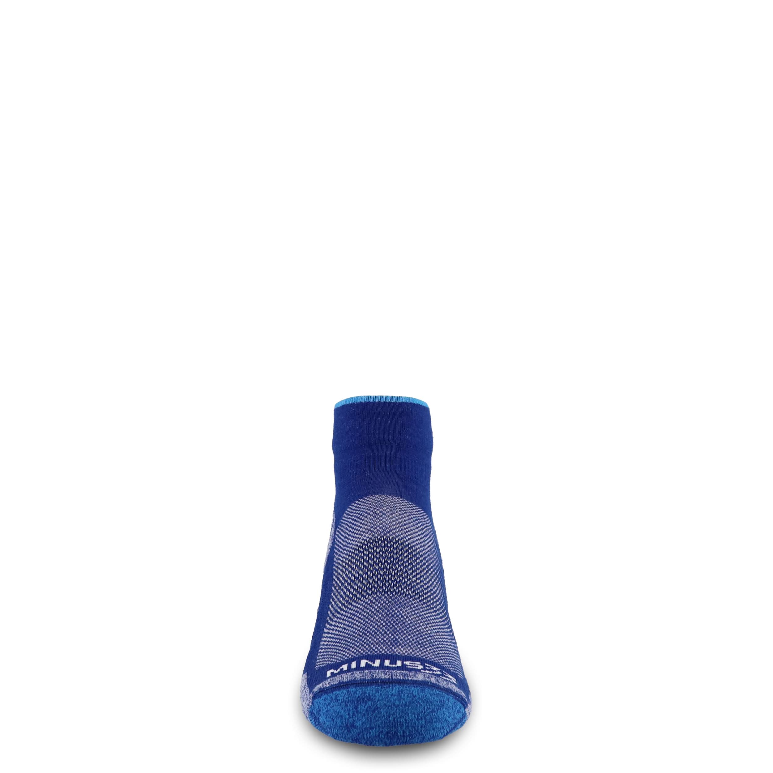 Merino wool trail running ankle socks in blue with arched pattern and logo at sole