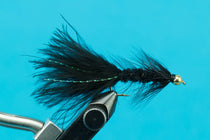 Beadhead Woolly Bugger fly, black marabou tail with gold bead