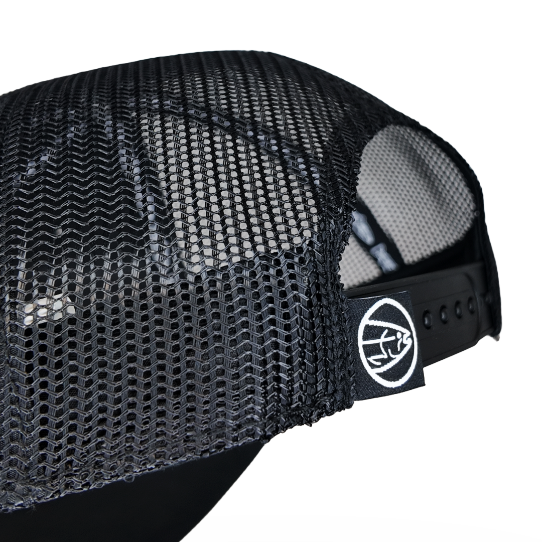 Black mesh trucker cap back with adjustable strap and circular logo patch