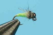 Barbless tungsten fishing fly with black body, green wing, and fuzzy fibers on hook