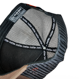 Black mesh trucker cap with inside label and patterned lining
