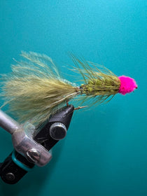 Olive egg sucking leech fly with olive hackle and magenta head on hook