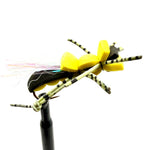 Novelty foam fly fishing lure with yellow foam head and striped black legs