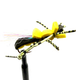 Novelty foam fly fishing lure with yellow foam head and striped black legs