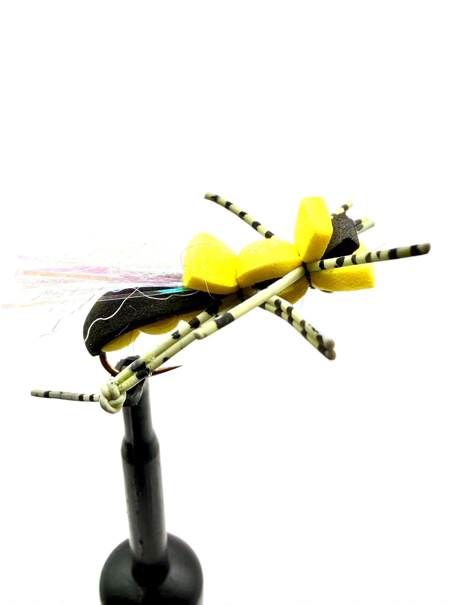 Novelty foam fly fishing lure with yellow foam head and striped black legs