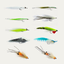 Saltwater fly assortment, mixed-color fishing lures with barbed hooks