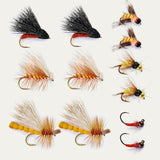 Assorted artificial fishing flies with feather bodies and treble hooks, orange and red accents