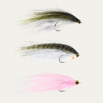 Baitfish-pattern fly assortment with three streamers, yellow eyes and multicolor tails