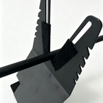 ARW hand wrapper tool close-up of black serrated grips on a bar